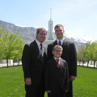 Alex, Chris, and Josh in front of the temple