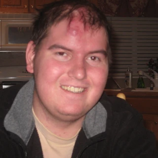 Alex smiling